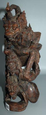 An Indonesian carved wood group